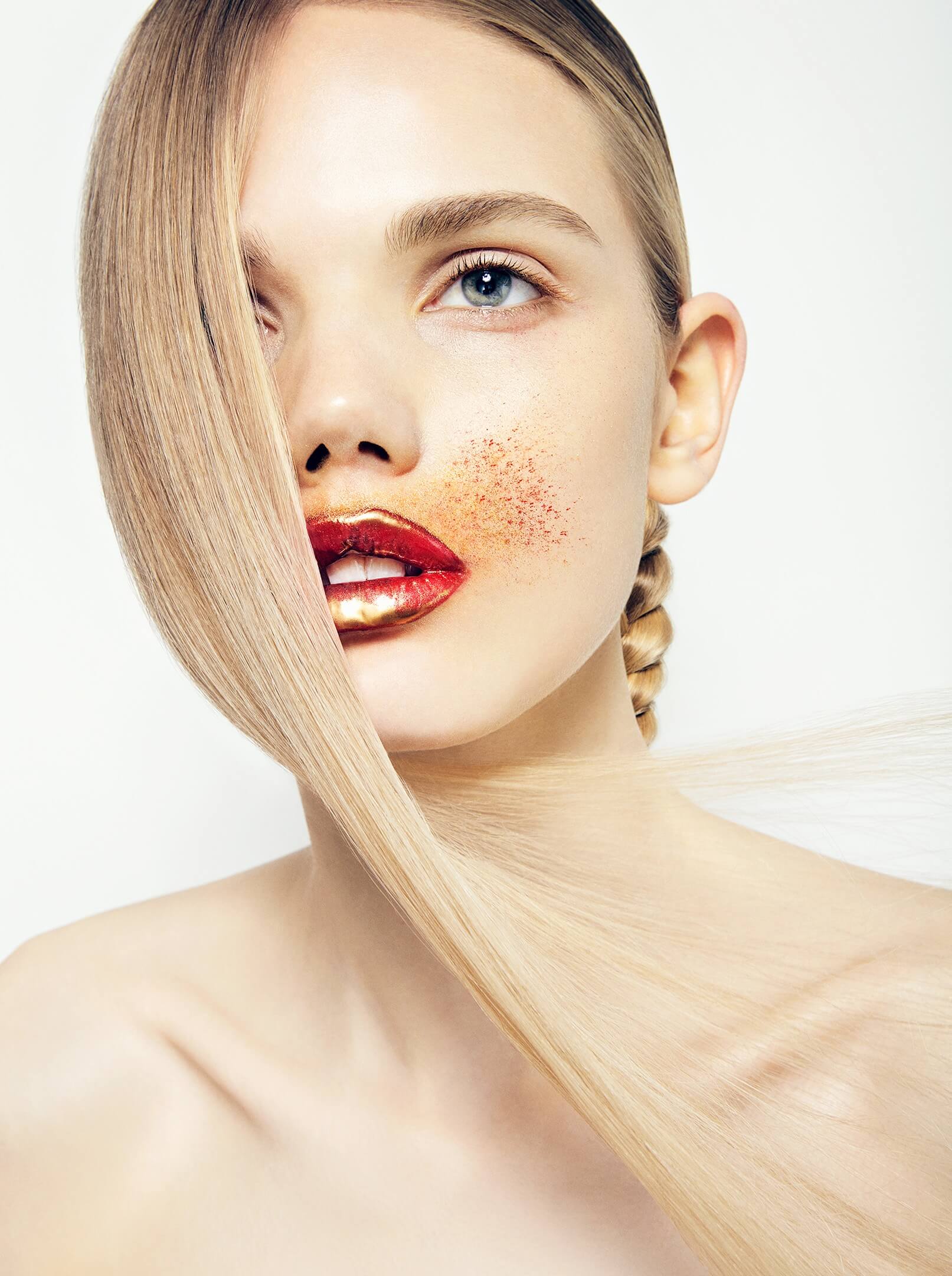Model glitter on cheek retouched by Chris Roome
